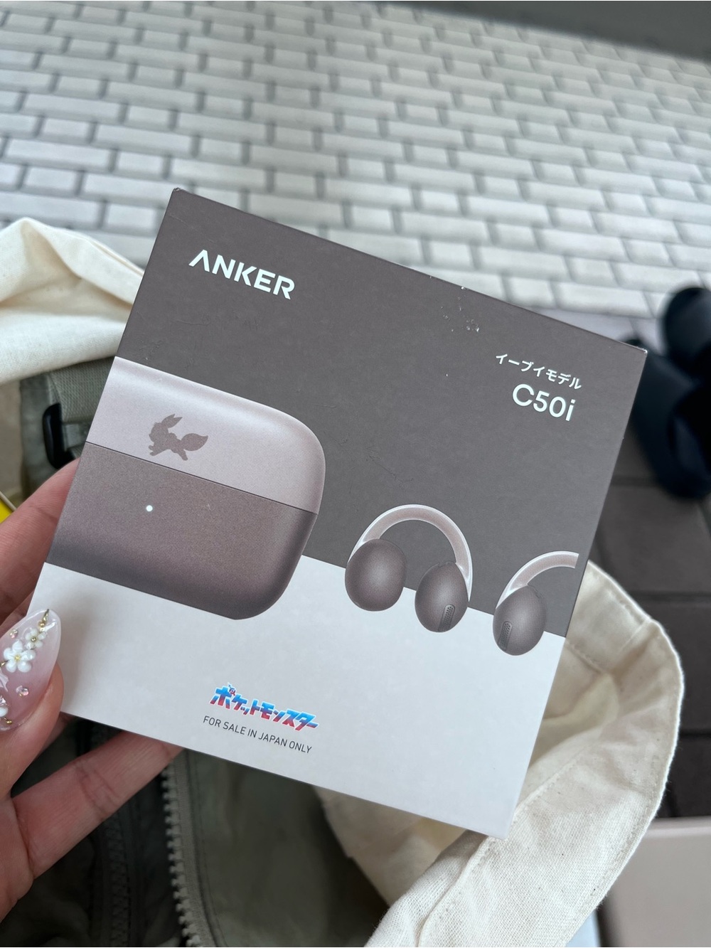 POKEMON EEVEE Anker Earbuds with Rose Gold and Light Gray Charging Case